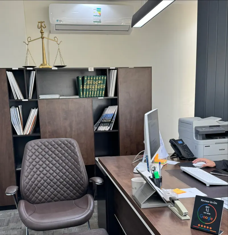 A lawyer's desk with a scale of justice